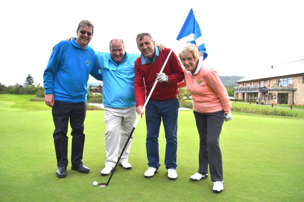 Alan Kennedy (red shirt) at the 18th hole with participants in the Caudwell Children Celebrity Golf Classic - compressed for press