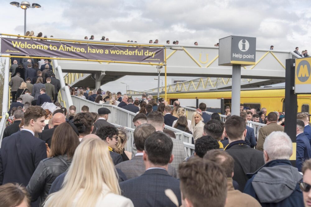 Racegoers arriving at Aintree Station 2019