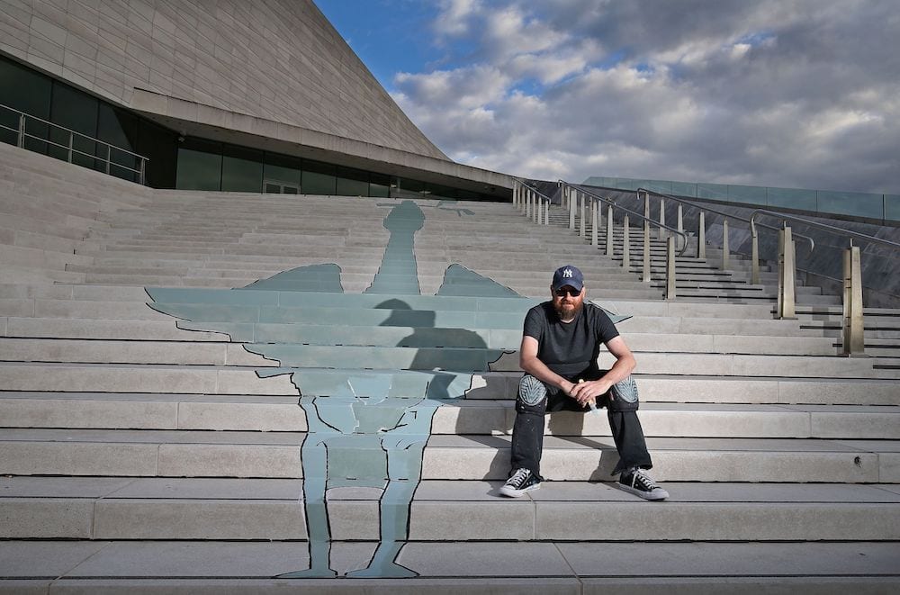 Look at the huge Liver Bird drawing on the Museum of Liverpool