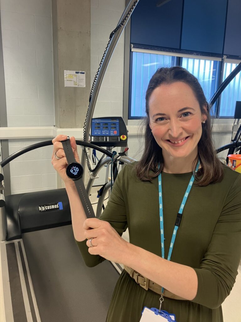 Dr Jess Hale with one of the smartwatches. Credit: Clatterbridge