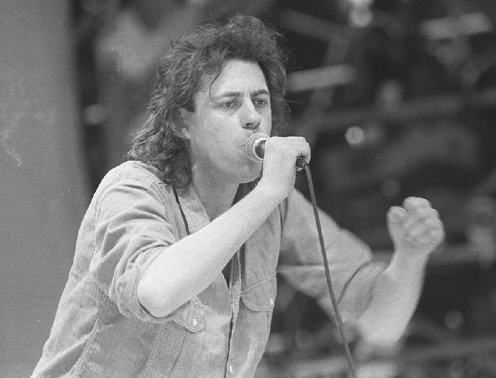 Bob Geldof sings at the Live Aid Concert at Wembley July 13, 1985. He initiated two day-long simultaneous concerts - one in England and one in America - which raised more than 50 million to aid famine relief.