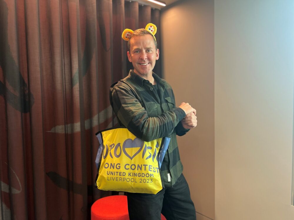 Scott Mills with one of the Eurovision bags in support of BBC Children in Need. Credit: BBC
