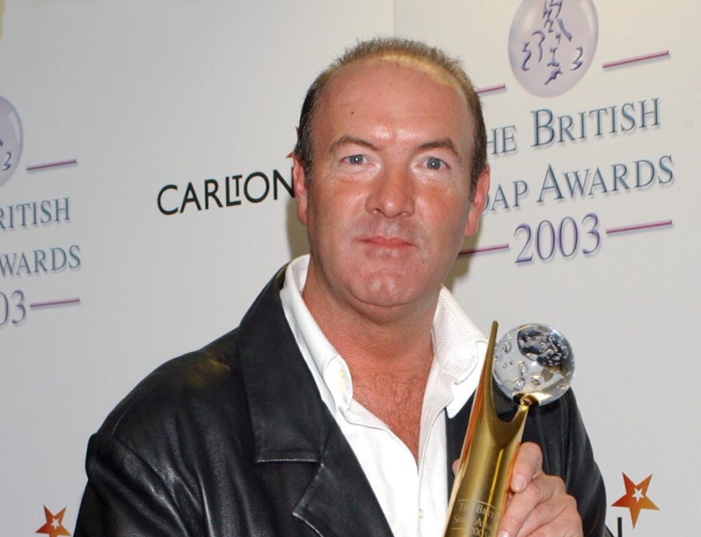 Brookside actor Dean Sullivan with his Special Achievement award during the British Soap Awards 2003. Credit: PA