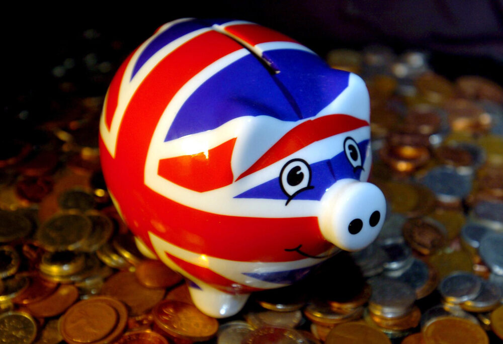 A Union Jack piggy bank on the day the UK officially went into recession. Credit: PA