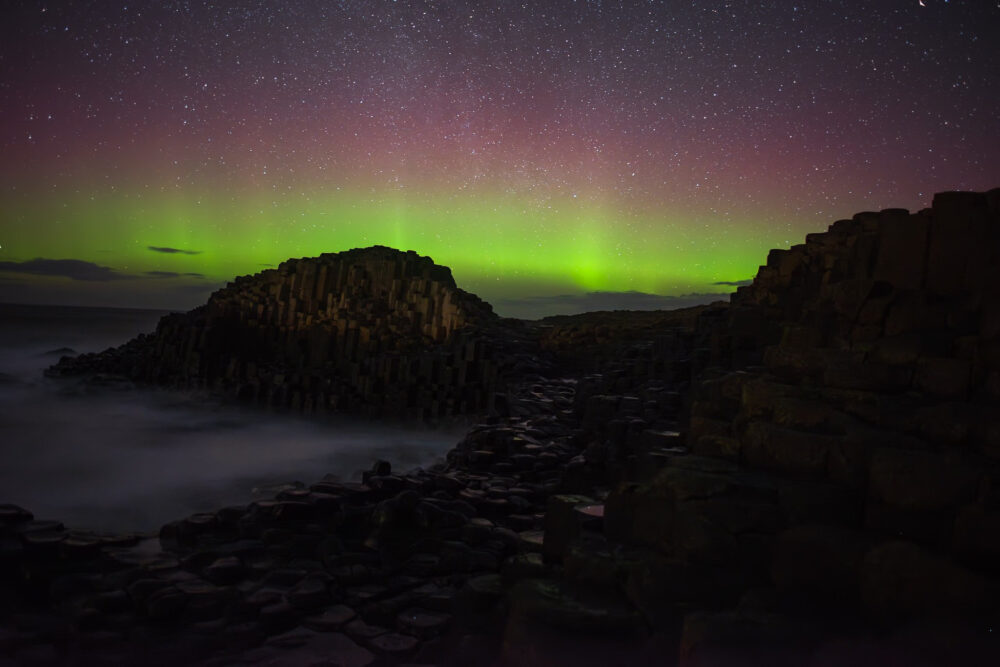 Handout photo taken with permission from the social media site X, formerly Twitter, by John O'Neill of the aurora borealis, also known as the northern lights, over the Giant's Causeway, Northern Ireland. Issue date: Monday March 4, 2024. Credit: PA
