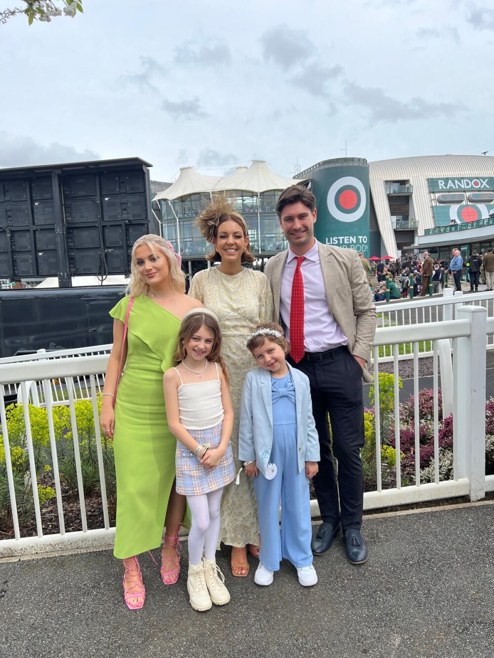 Ladies Day Style Awards 2024 judges. (L-R) Emily Sleight, Gemma Cutting, Frankie Foster - with their 2 little helpers. Aintree Racecourse - The Guide Liverpool