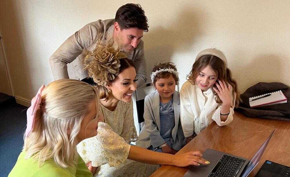 Ladies Day Style Awards 2024 judges get to work. (L-R) Emily Sleight, Gemma Cutting, Frankie Foster - with their 2 little helpers. Aintree Racecourse - The Guide Liverpool