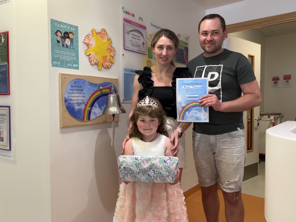 Ukrainian evacuee Zlata rings end of treatment cancer bell at Alder Hey