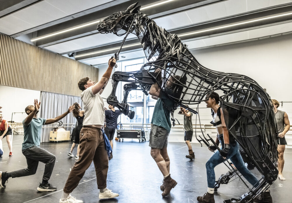 The cast of War Horse in rehearsals. Credit Pamela Raith Photography