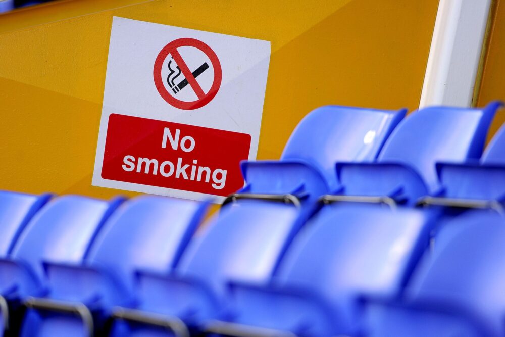 Spaces outside football stadiums could be included in the outdoor smoking ban. Image: Dave Howarth/PA