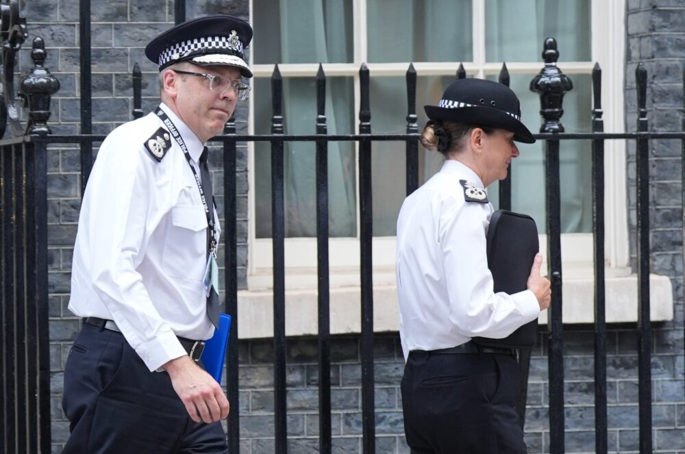 Metropolitan Police Assistant Commissioner Matt Twist (centre) and Deputy Commissioner Lynne Owens leave Number 10 Downing Street, London, after a meeting with Prime Minister Sir Keir Starmer and senior policing leaders following scenes of violent unrest. Credit: Yui Mok/PA