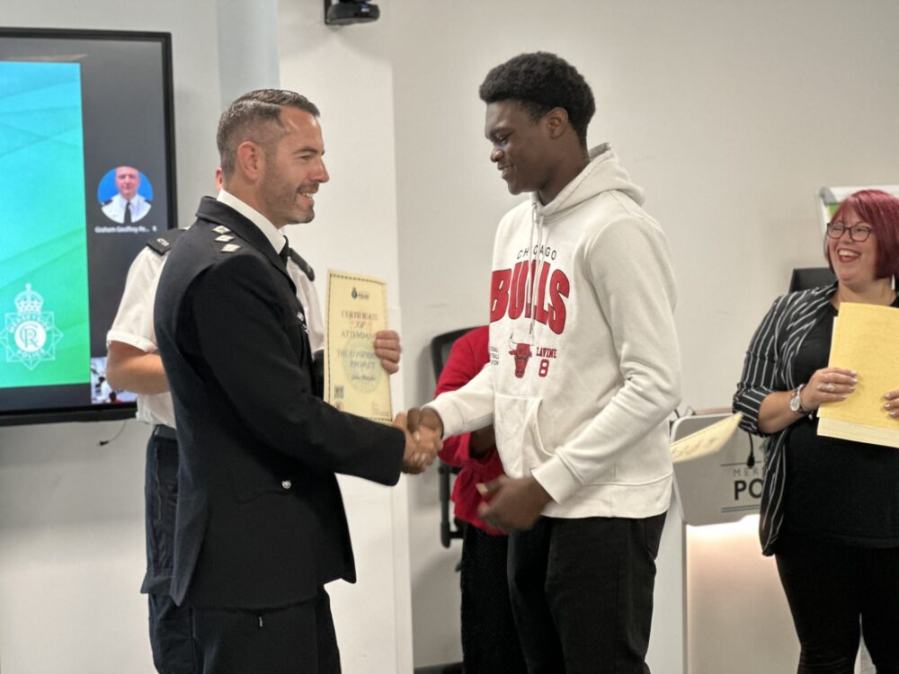 Certificate presentation. Credit: Merseyside Police