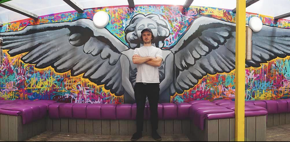 Street artist who makes murals across the world brings art back home to Merseyside