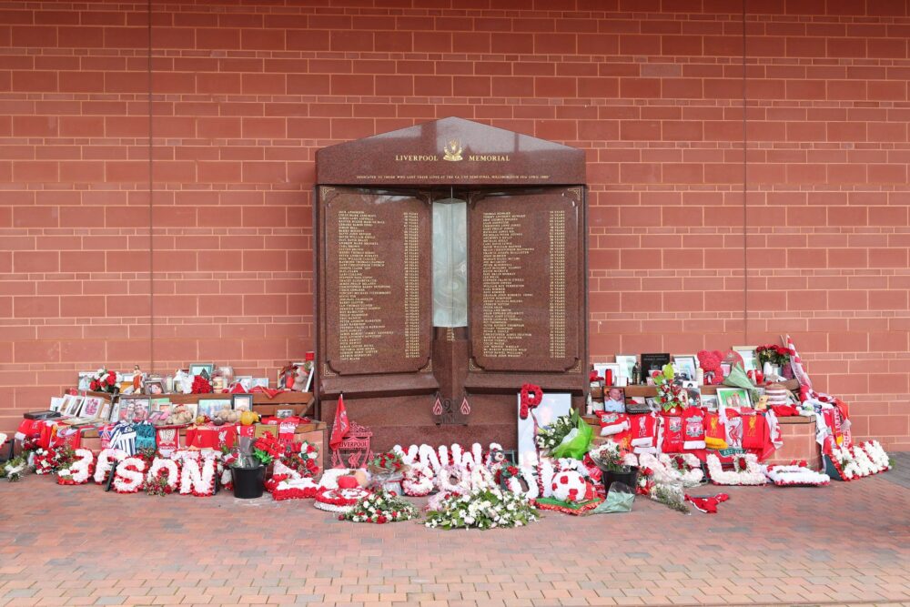 Flowers and tributes left at the Hillsborough Memorial outside Anfield stadium, Liverpool. Credit: Peter Byrne/PA.