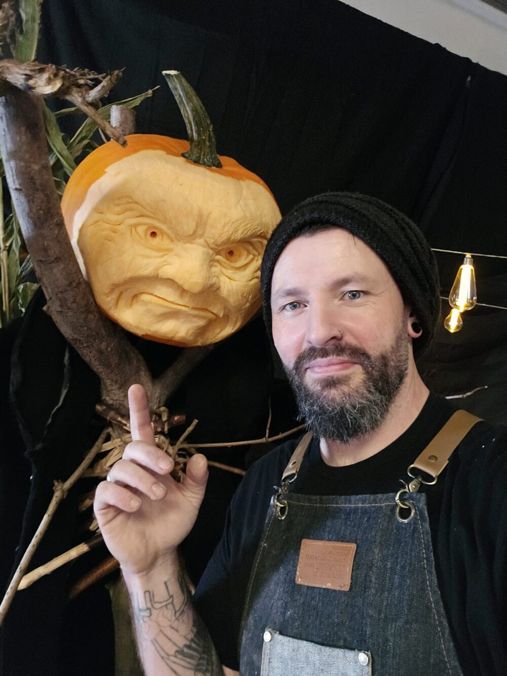 Paul Crawford with his carved pumpkin