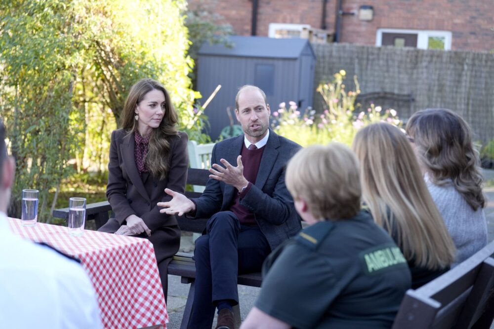 The Prince and Princess of Wales speak to members of the emergency services. Credit: Danny Lawson/PA