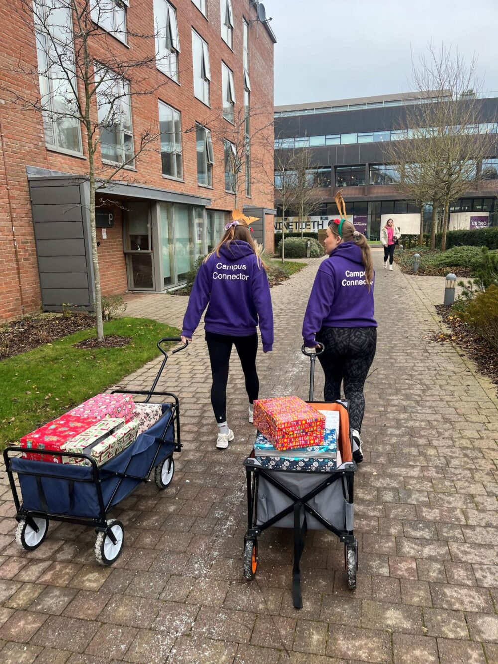 Campus connectors delivering hampers. Credit: Edge Hill