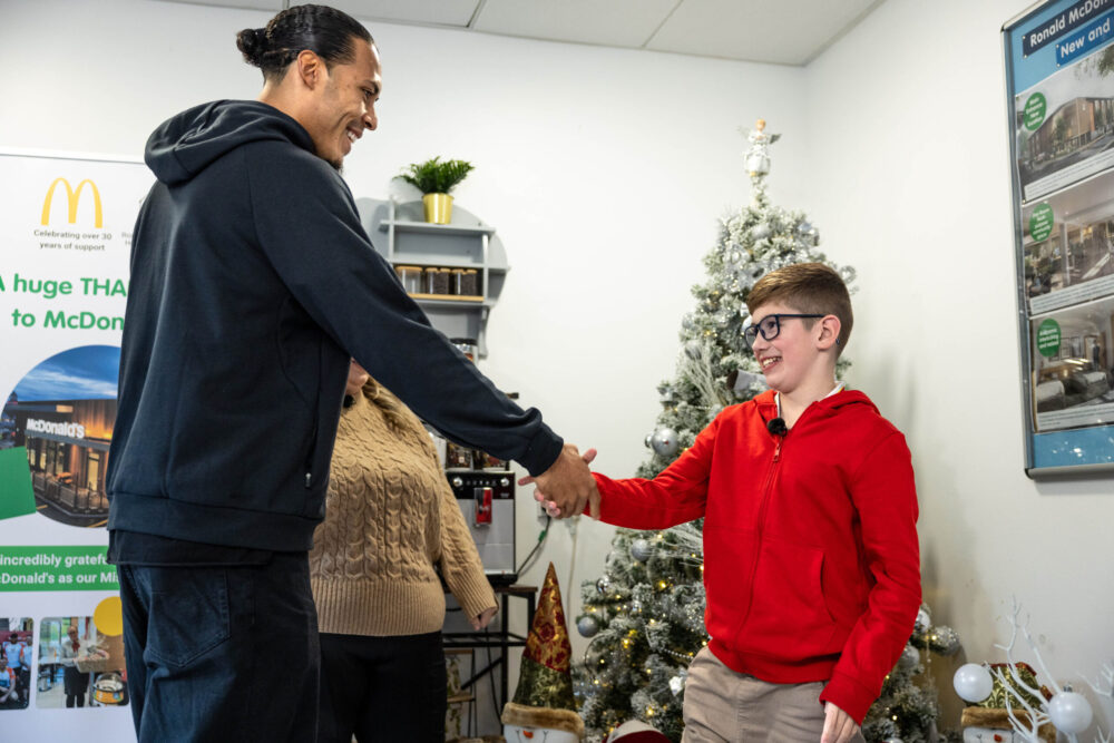 Virgil Van Dijk meets ten-year-old Oliver during a visit to Ronald McDonald House Alder Hey in Liverpool. Credit: James Speakman / PA