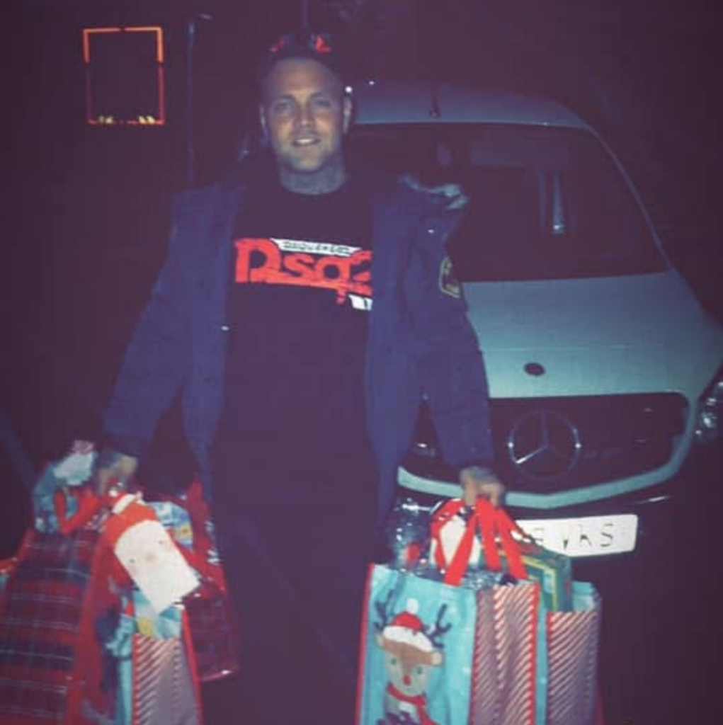 Jon goes out delivering Christmas presents to kids who might otherwise go without