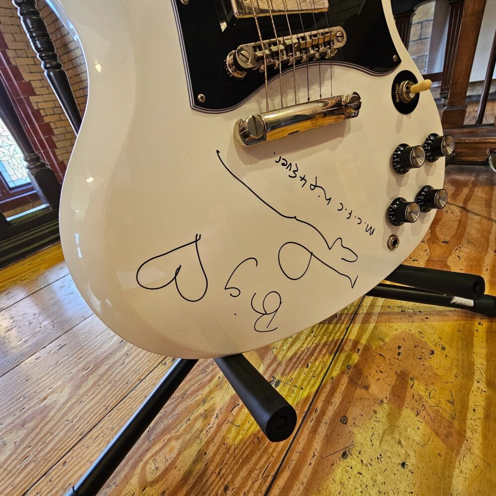 The signed guitar donated by Noel Gallagher to The Florrie