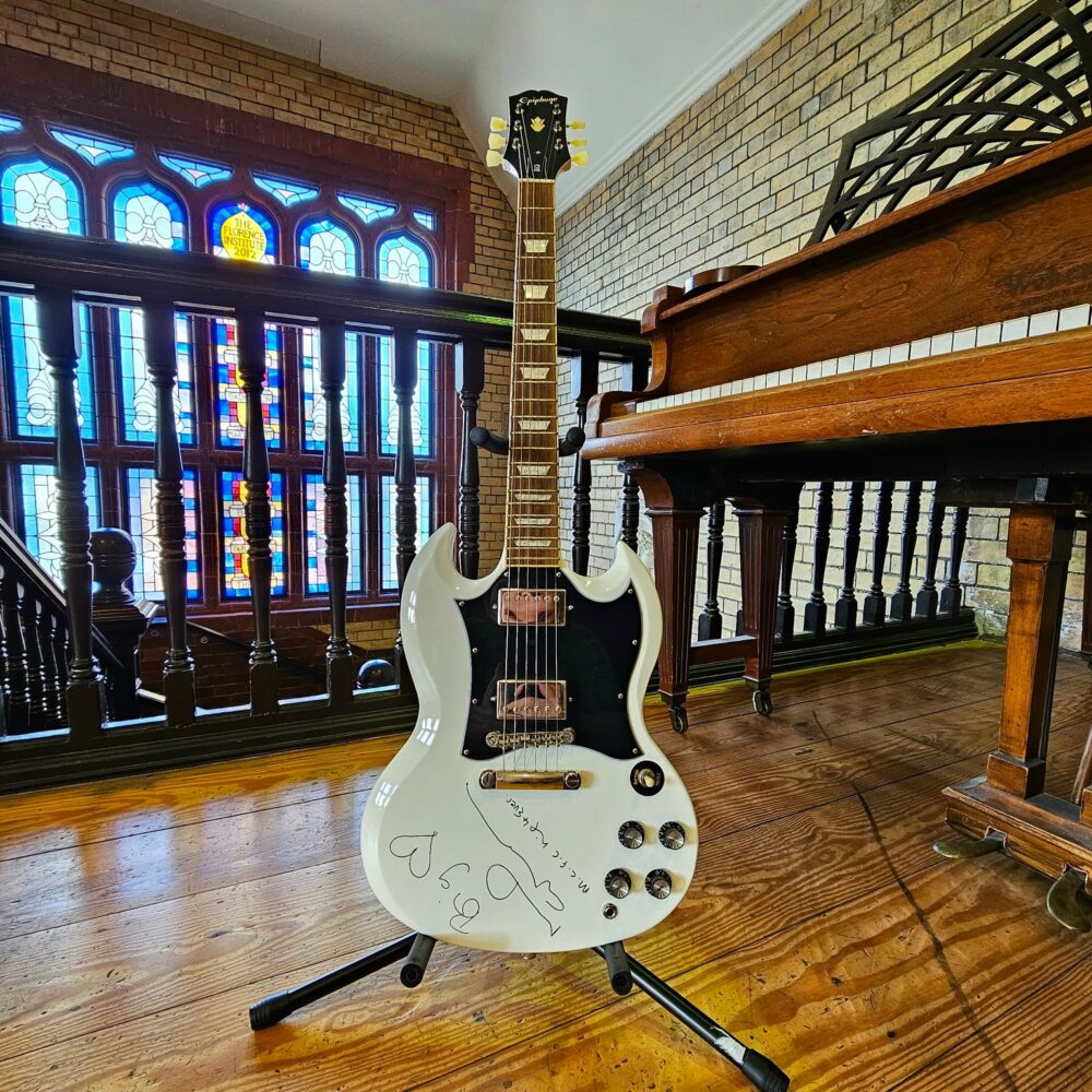 The signed guitar donated by Noel Gallagher to The Florrie