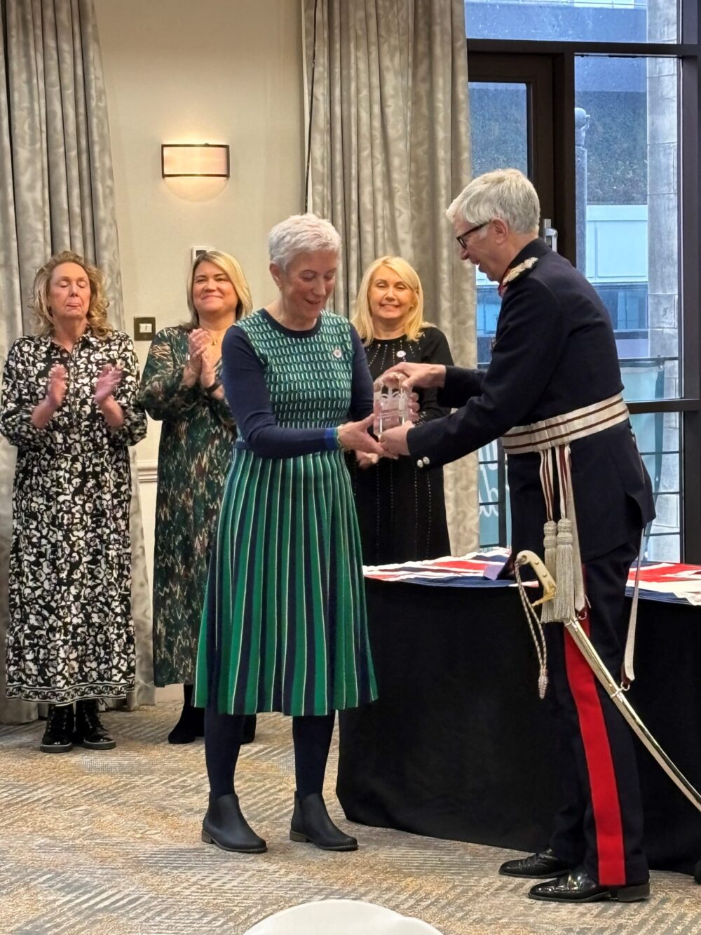 Ann Coffey, group lead, being presented with the King’s Award for Voluntary Services by His Majesty’s Lord-Lieutenant for Merseyside, Mr Mark FW Blundell.