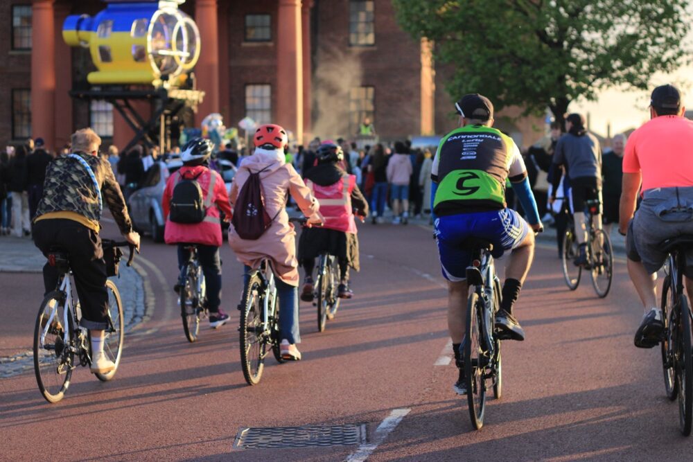 The Joy Ride passes the Albert Dock