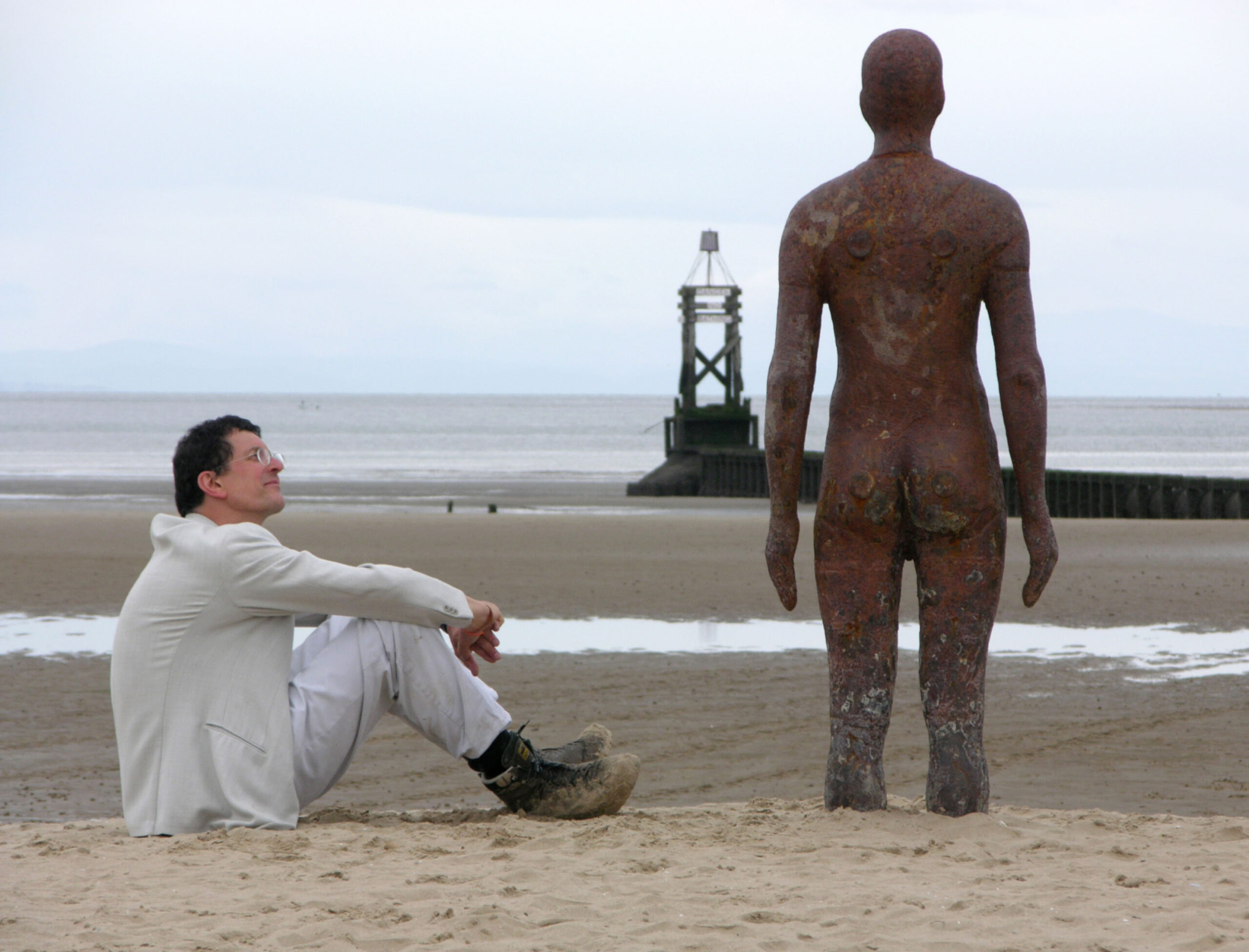 Anthony Gormley With Iron Men