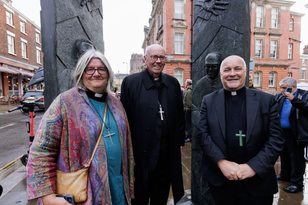 Anglican bishops and Roman Catholic clergy join prayer walk in Liverpool