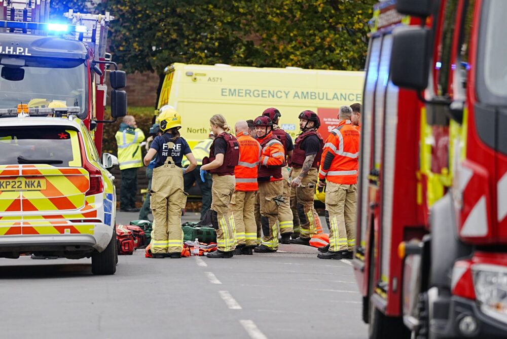 Four injured after car driven at people and man stabbed outside synagogue