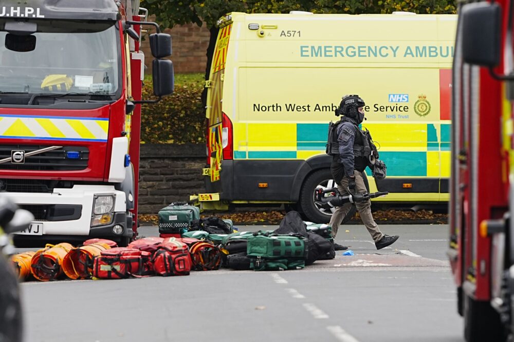 Two dead and suspect shot after suspected terror attack at synagogue