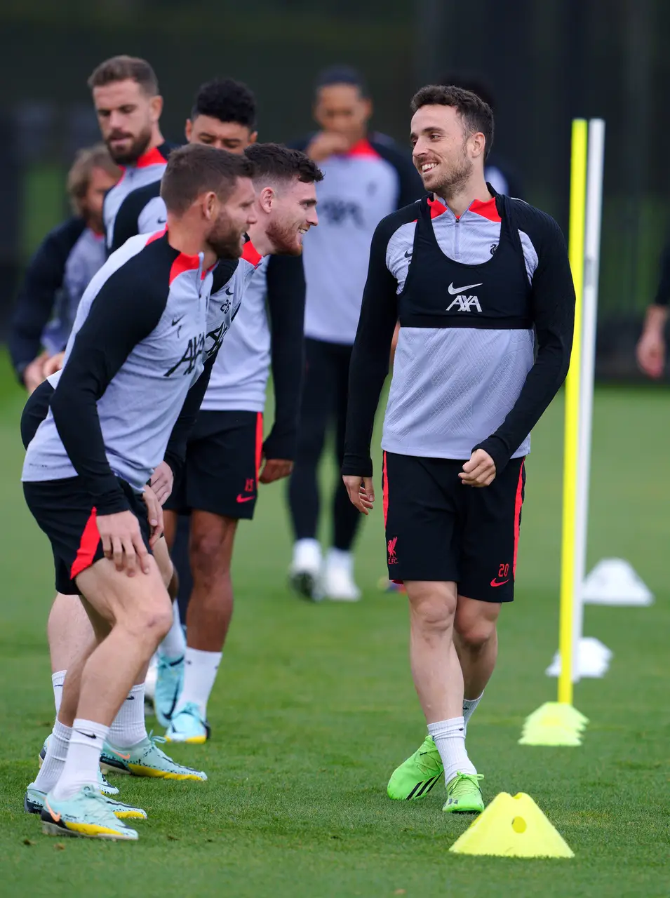Diogo Jota, right, with Andy Robertson and James Milner, left, during a Liverpool training session (Credit: Peter Byrne/PA)
