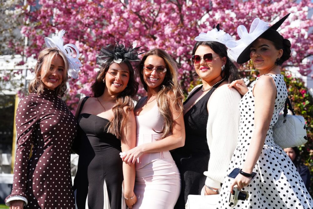 Racegoers enjoying sunshine at Aintree ahead of The Grand National