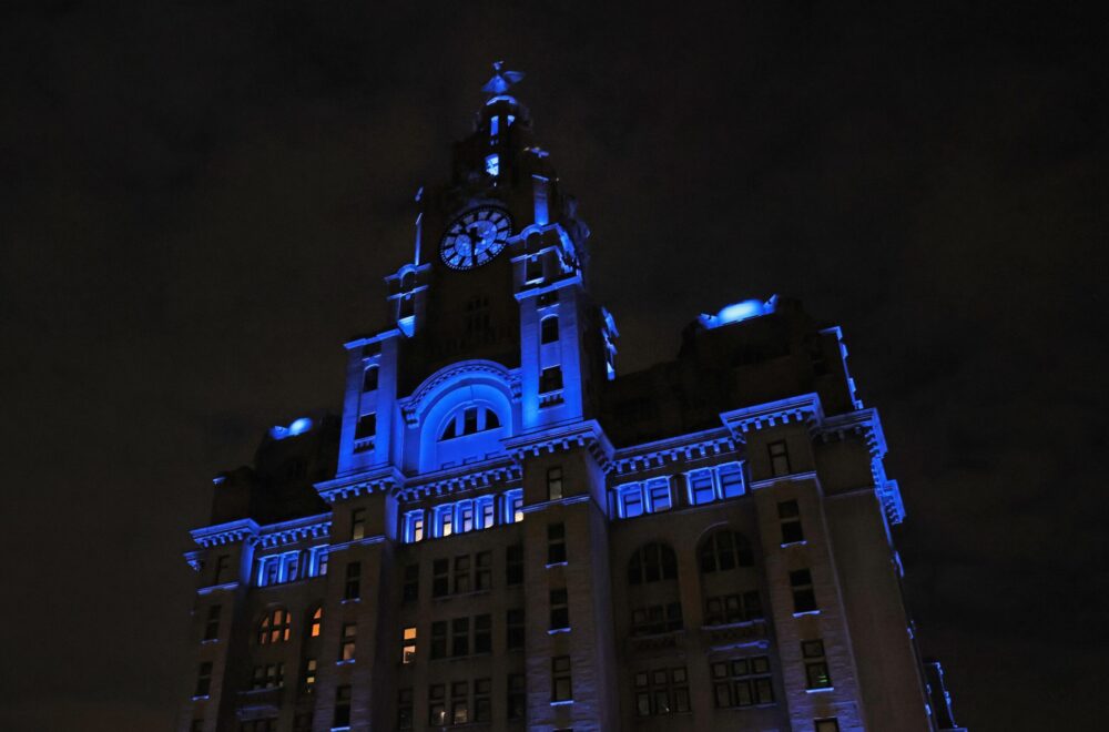 Why Liverpool landmarks are lighting up blue as part of a global celebration