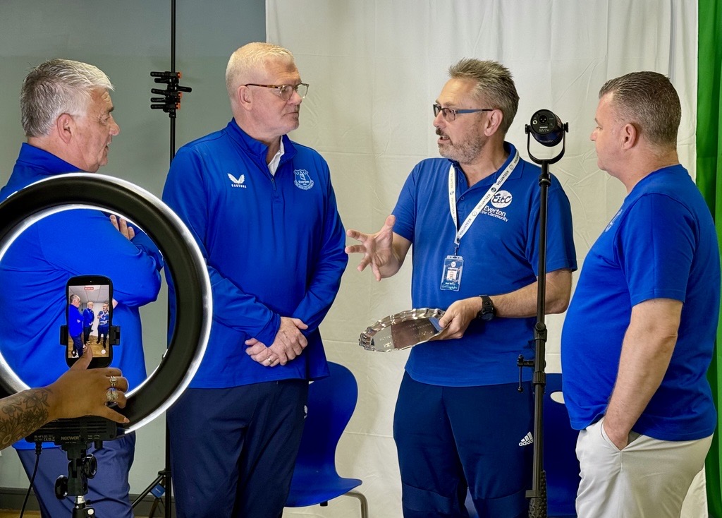 Everton legends surprise volunteer with special community award